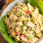 Delicious Curry Chicken Salad with vibrant ingredients in a bowl.