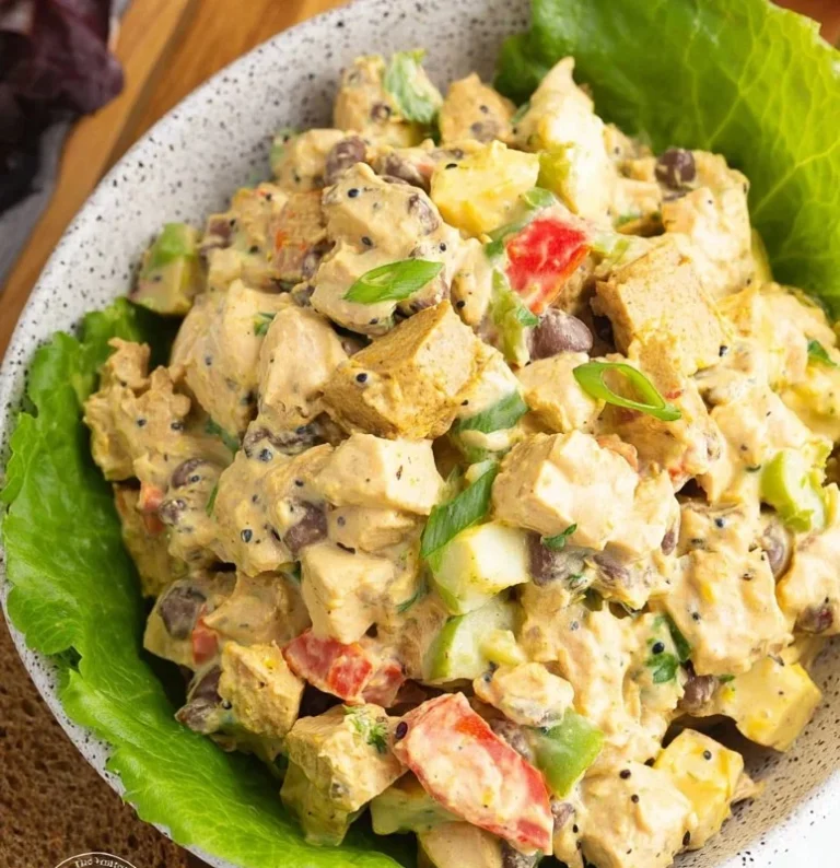 Delicious Curry Chicken Salad with vibrant ingredients in a bowl.