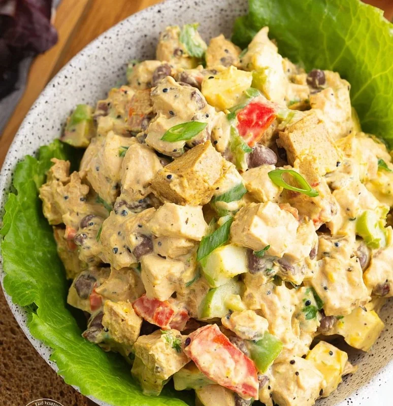 Delicious Curry Chicken Salad with vibrant ingredients in a bowl.