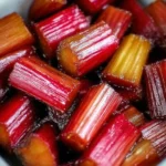 Delicious vegan maple-glazed roasted rhubarb served on a plate.