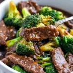 Low-carb beef and broccoli dish served with vegetables