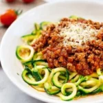 Healthy Turkey Bolognese served with zucchini noodles in a bowl.