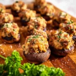 Delicious air fryer sausage stuffed mushrooms cooked to perfection, ready to serve.