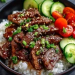 Plate of Beef Yakiniku served with vegetables and rice