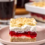 Cherry Yum Yum dessert with layers of cherries, cream, and crust