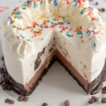 Homemade Copycat Dairy Queen Ice Cream Cake with chocolate and vanilla layers.