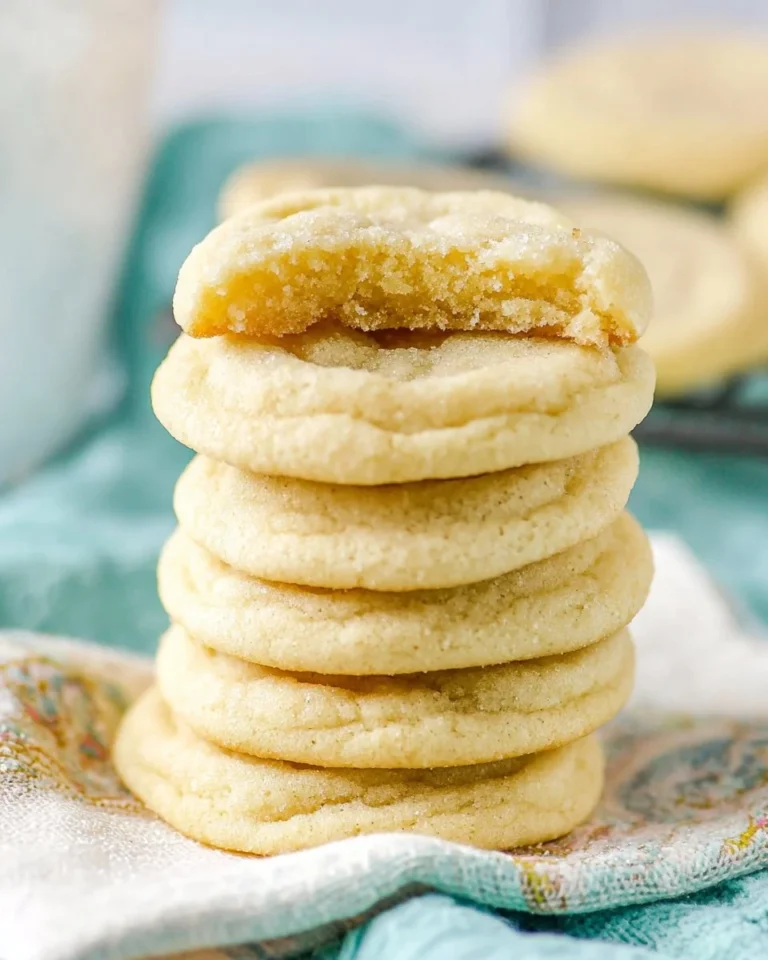 Easy sugar cookie recipe with decorated cookies on a plate