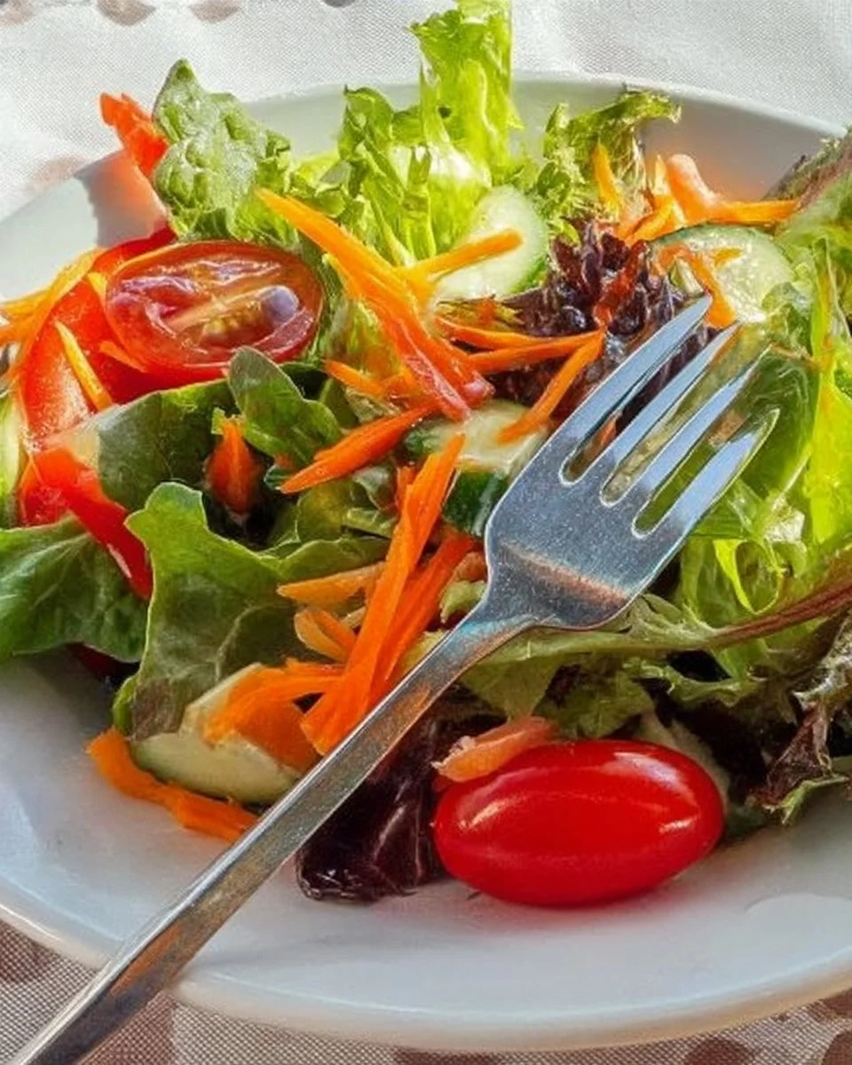 A colorful salad for a crowd, featuring fresh vegetables and vibrant ingredients.