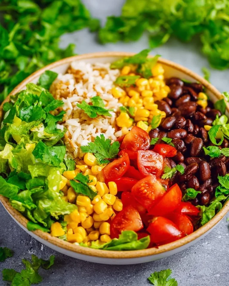 Colorful Vegetarian Burrito Bowl Salad with fresh veggies and beans
