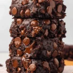 Delicious chocolate zucchini banana bread slice on a plate
