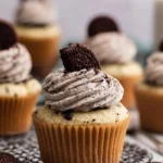 Delicious Cookies and Cream Cupcakes topped with creamy frosting and cookie crumbles.