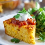 Delicious homemade corn pie served with a golden crust and fresh ingredients.