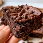 Delicious fudgy healthy brownies on a wooden surface