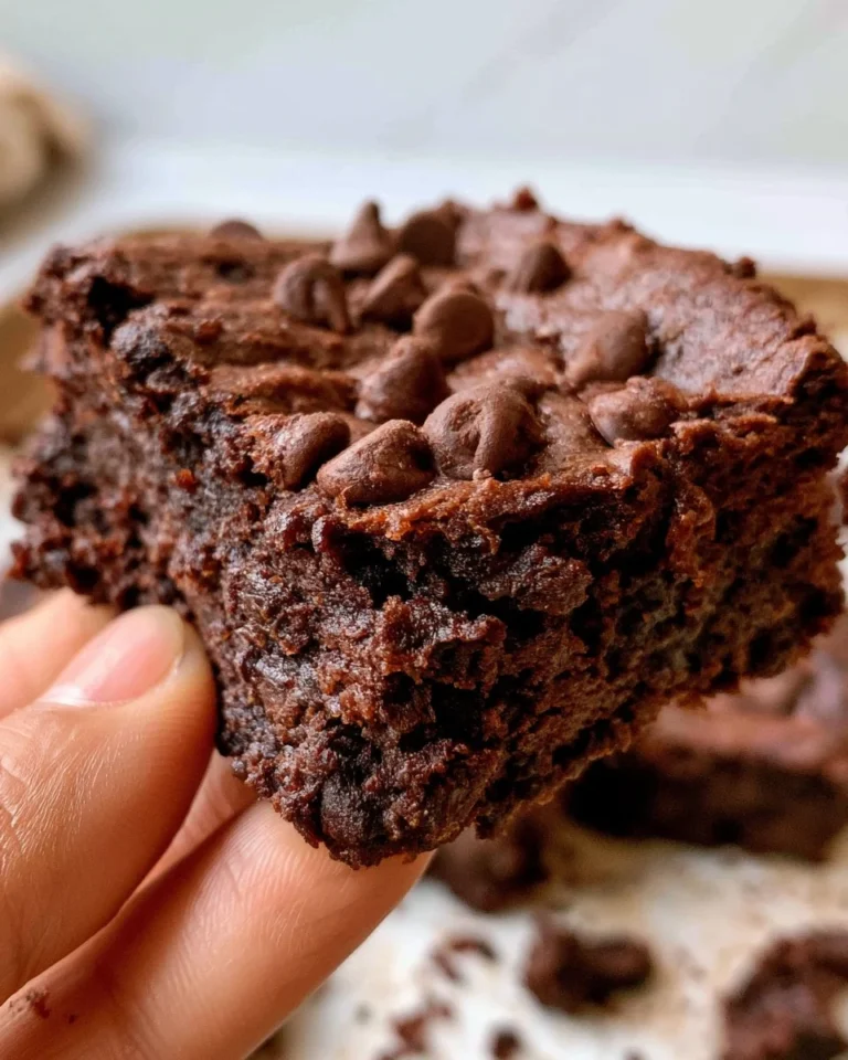 Delicious fudgy healthy brownies on a wooden surface