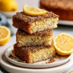 Healthy Lemon Poppy Seed Crumb Cake topped with lemon zest and poppy seeds.