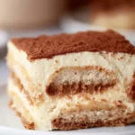 Gluten-free Healthy Tiramisu dessert topped with cocoa powder