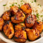 Delicious hot honey salmon bites served on a platter