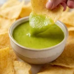 Bowl of fresh jalapeño salsa with chips ready for serving