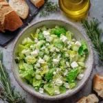 Fresh Maroulosalata Greek salad with crisp lettuce, herbs, and dressing