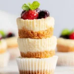 Mini protein cheesecakes topped with fresh fruit for a healthy dessert option