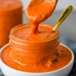 A bowl of roasted cherry tomato sauce made from fresh ingredients