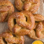Soft homemade pretzels baked to golden perfection, ready to enjoy.