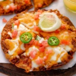 Taco Bell Mexican Pizza topped with cheese, beans, and fresh ingredients