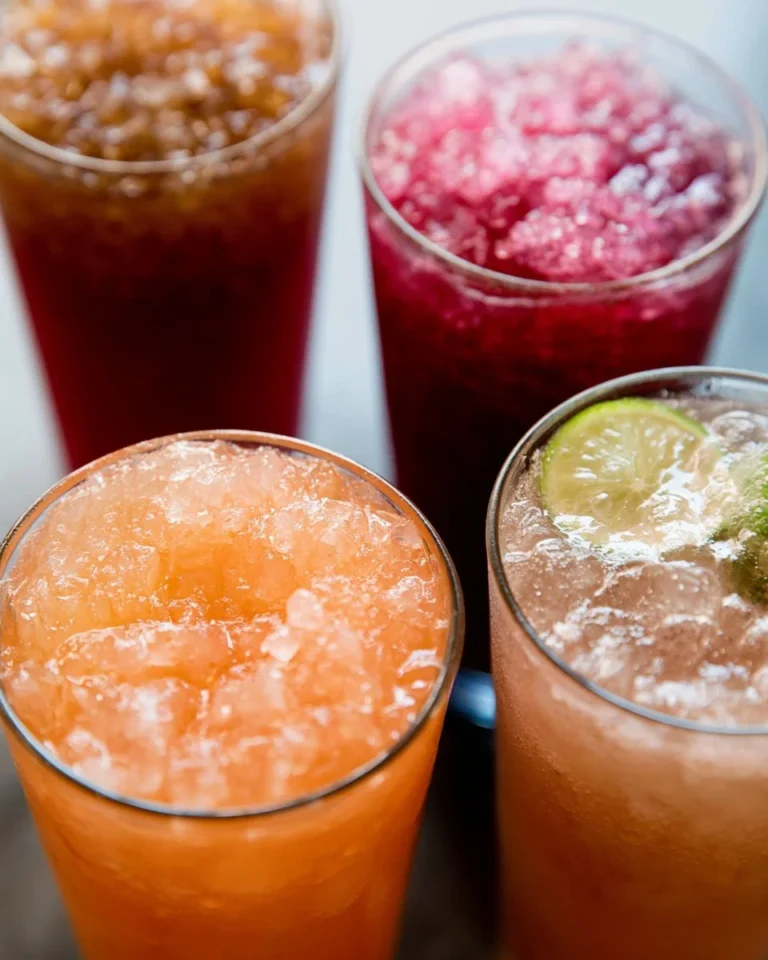 Colorful dirty soda drinks with various flavors and garnishes.