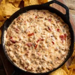 Three ingredient sausage dip in a bowl, perfect for parties