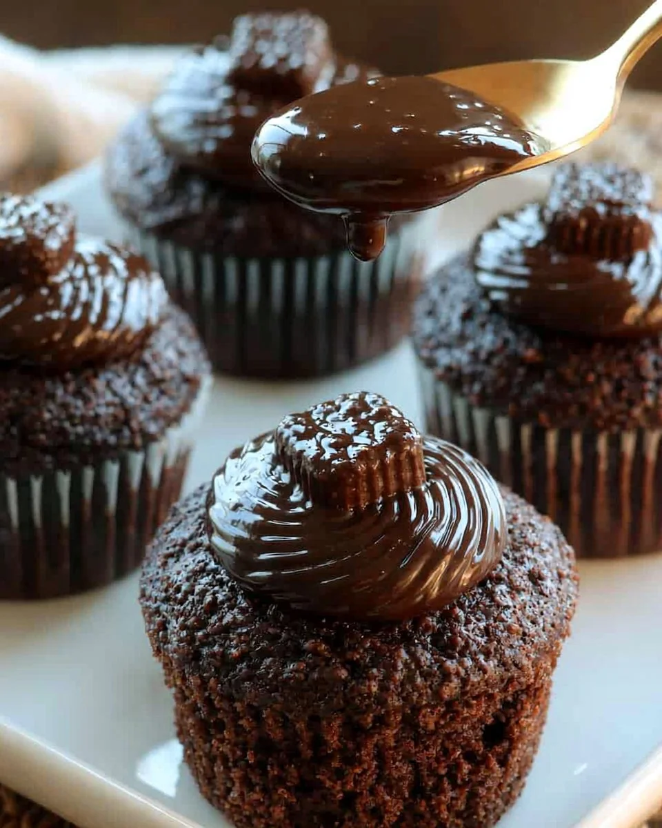 Decadent chocolate cupcakes topped with rich chocolate frosting and sprinkles