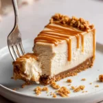Delicious creamy no bake Biscoff cheesecake garnished with Biscoff crumbs