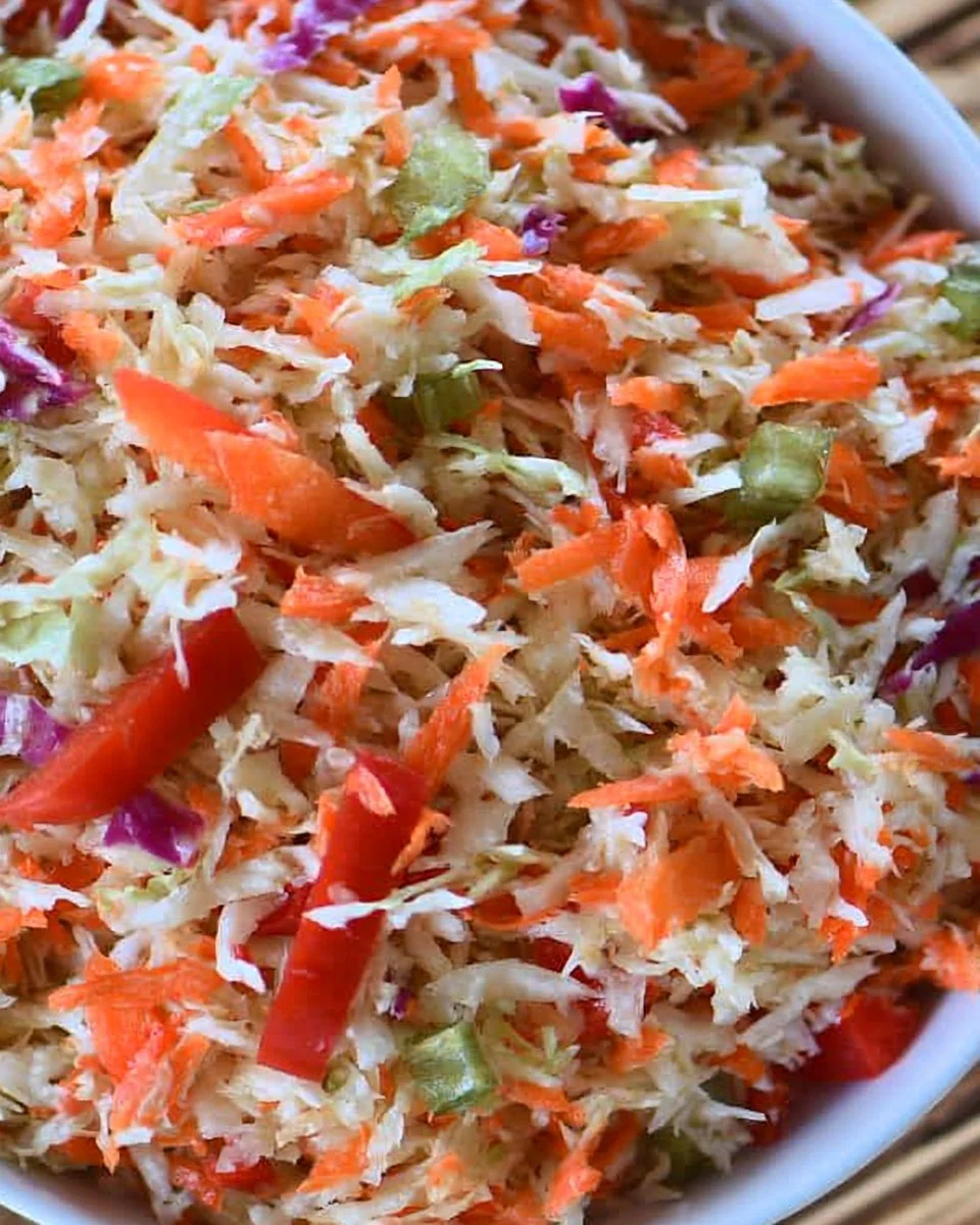 Bowl of homemade freezer slaw ready for freezing and meal prep