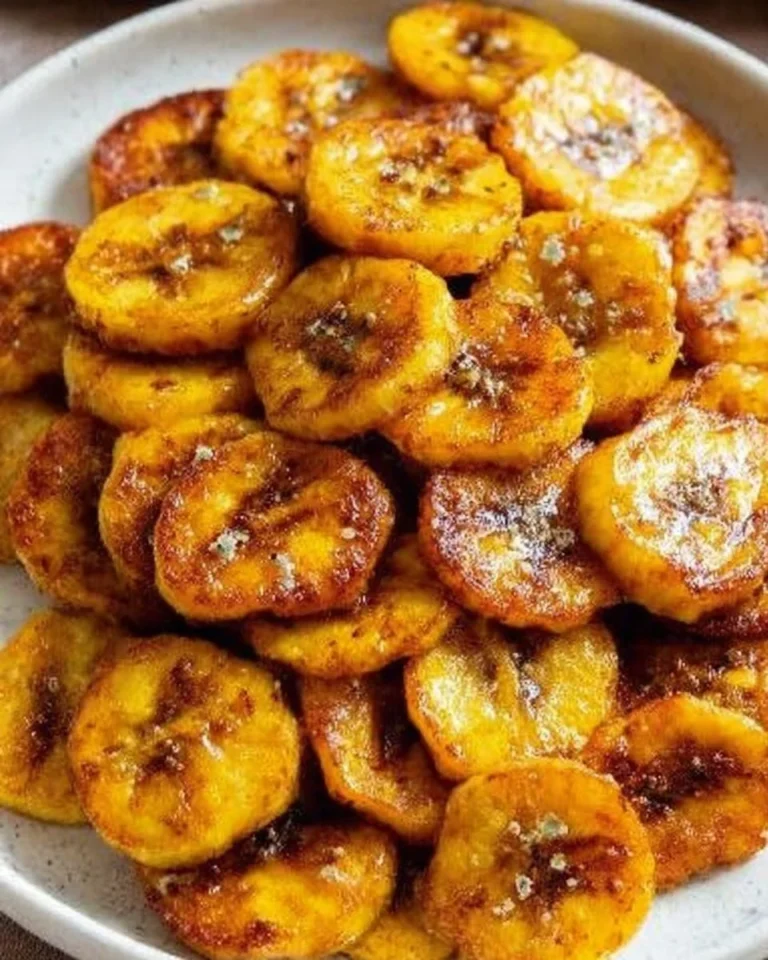 Plate of golden fried sweet plantains served as a tasty side dish.