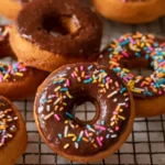 Delicious Greek yogurt donuts topped with icing and sprinkles