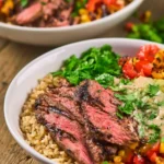 Grilled steak burrito bowls filled with fresh ingredients and bold flavors.