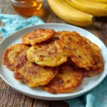 Delicious Jamaican plantain fritters served on a plate.