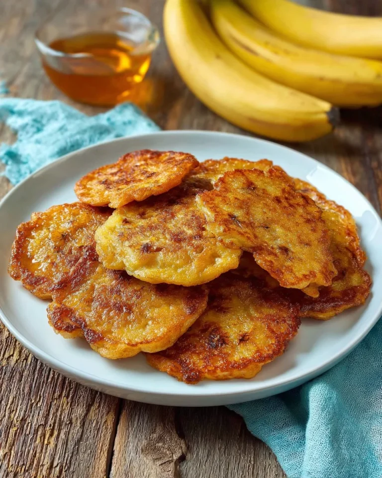 Delicious Jamaican plantain fritters served with dipping sauce.