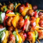 Delicious sweet and sour meatball kabobs ready for grilling.